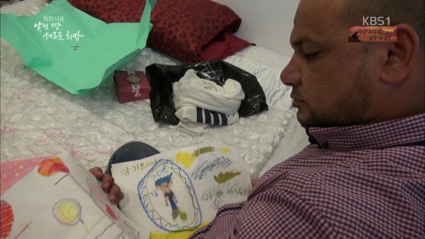 이라크 난민 삼남매....jpg_11.jpg