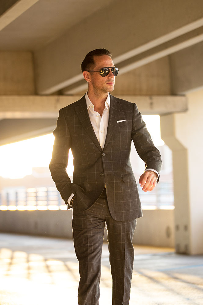 grey-windowpane-suit-white-shirt-no-tie-aviators-cool-badass-look-amazing-backlight-parking-garage-4.jpg