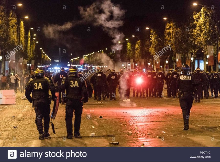 paris-france-10th-july-2018-riot-police-deploy-as-france-supporters-celebrate-on-the-champs-elysee-avenue-in-paris-france-on-july-10-2018-after-the-french-national-team-beats-the-belgian-national-team-in-the-fifa-world-cup-semi-fin.jpg