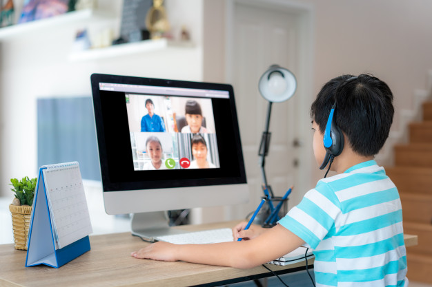 asian-boy-student-video-conference-e-learning-with-teacher-and-classmates-on-computer-in-living-room-at-home-homeschooling-and-distance-learning-online-education-and-internet_73503-2130.jpg